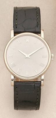 an image of a wrist watch with roman numerals on it