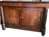 a wooden cabinet with a marble top on a white background