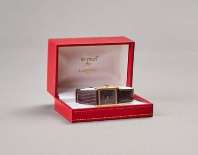 a red box with a watch inside of it
