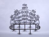 wrought iron garden trellis with flowers and vines
