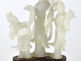 Figurine chinoise en jade sculpté représentant une femme et deux enfants
