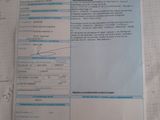 a lot of papers on a table with a calculator and pen