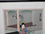 painting of a woman in a kimono sitting on the floor