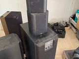 a lot of speakers that are stacked on top of each other