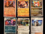 a lot of cards that are on the table