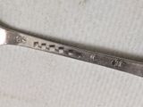 a spoon that has some type of spoon on it