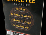 a box of bruce lee ' s album on the table