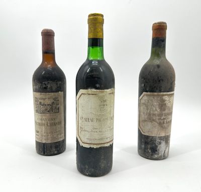 three bottles of wine sitting next to each other on a white surface