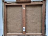 an old wooden easel with a piece of paper on top of it