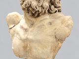 an image of a bust of a man with a beard on a pedestal