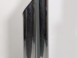a silver vase that is sitting on a table