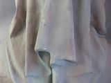 a statue of a woman with a veil on her head