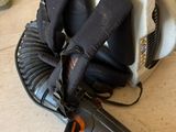 an image of a blower and other tools on the floor