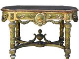 a green table with a black top and a gold base