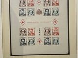 an image of a framed picture of a group of people on stamps