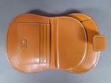 an image of a brown leather wallet with a card holder