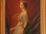 portrait of a lady in a green dress in a gold frame