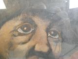 un tableau représentant un homme moustachu et coiffé d'un chapeau