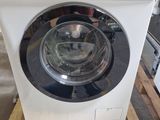 a washing machine that is sitting on a pallet