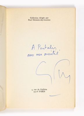 un livre ouvert, avec un titre écrit à la main et l'image d'un éléphant