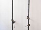 two lamps that are on the wall next to each other