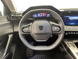 the interior of a car with a steering wheel, dashboard, and dash board