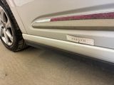 a close up of a car ' s bumper with a sticker on it