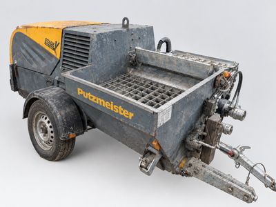 a close up of a trailer with a machine attached to it