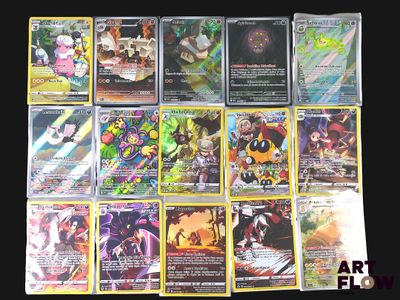 a lot of pokemon cards that are on the table