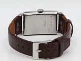 an image of a close up of a wrist watch on a white surface