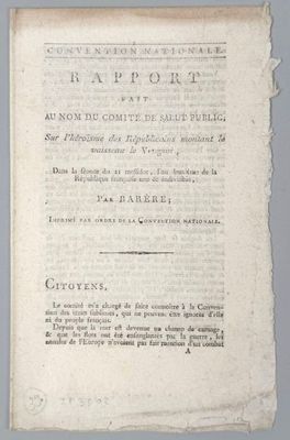 un vieux livre écrit posé sur une table