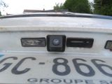 a close up of a license plate on the back of a truck