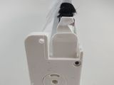 a close up of a white object on a white surface