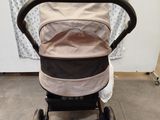a baby stroller that is sitting on the floor