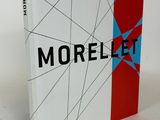 an image of a book with a red, white and blue cover