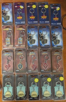 64 / Lot de 20 porte-clés de différentes licences (Les…