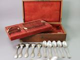 a wooden box with a set of silverware in it