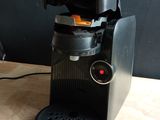 a coffee maker that is sitting on a table