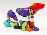 brightly colored ceramic bear figurine on a white background