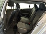 the back seats of a silver car are empty and ready to be used