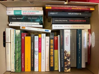 a box full of books that are sitting on a table