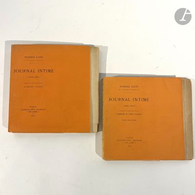 two books sitting on top of a table next to each other