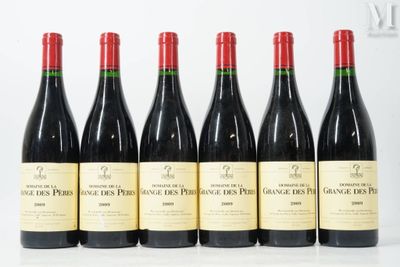 six bottles of red wine are lined up in a row