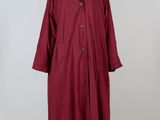 un manteau rouge sur un mannequin, un mannequin, un mannequin, un mannequin, un mannequin, un mannequin, un mannequin, un mannequin, un mannequin