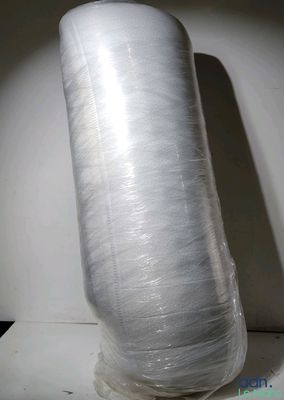 a large roll of plastic wrapped up on a table