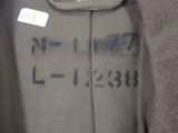 a close up of a shirt with a tag on it