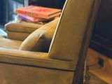 a chair that is sitting in front of a tv