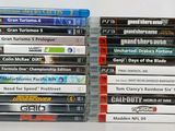 un grand nombre de jeux vidéo empilés les uns sur les autres