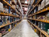 shelves in a warehouse with boxes and boxes on them