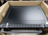 a box with a laptop inside of it on a table